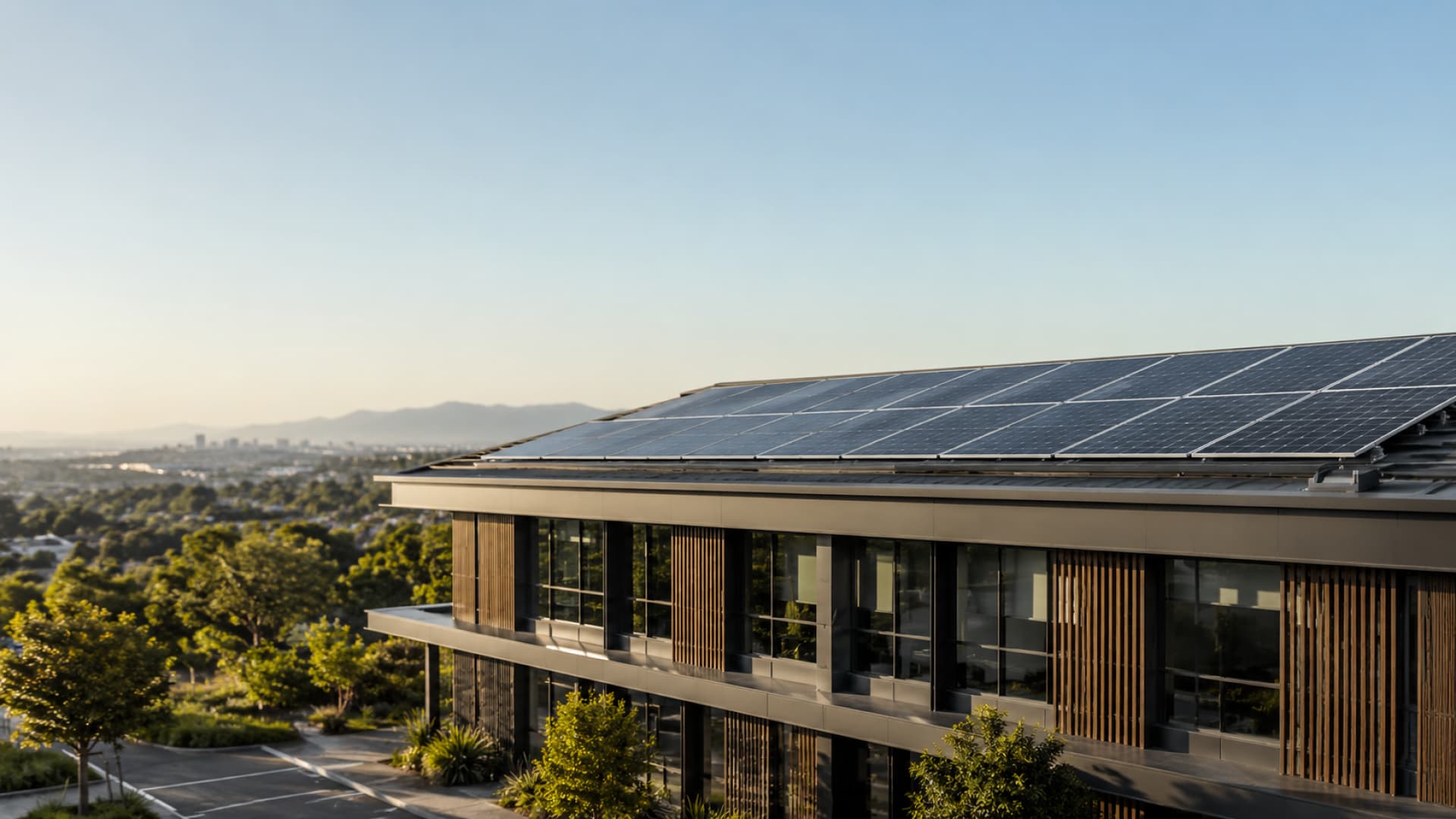 Commercial solar panels on a South African business roof with finance planning documents